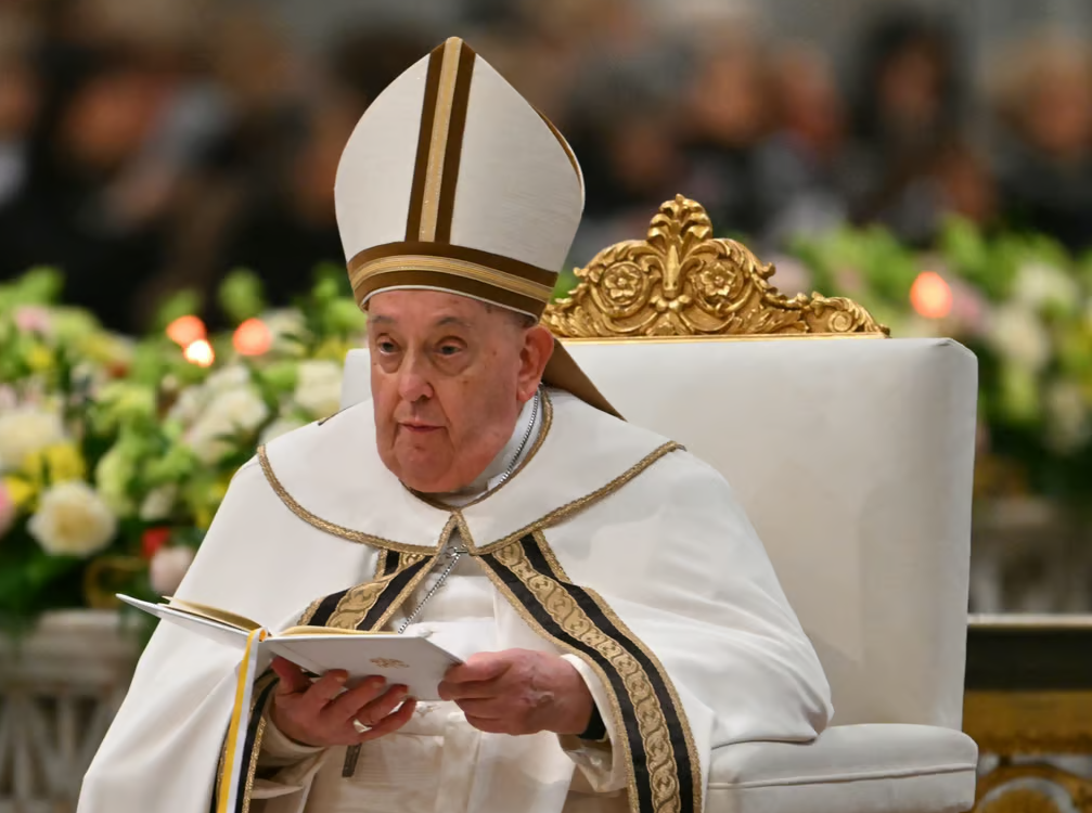 An image of Pope Francis, the beloved pontiff, leading a service with deep compassion for the faithful during his lifetime.