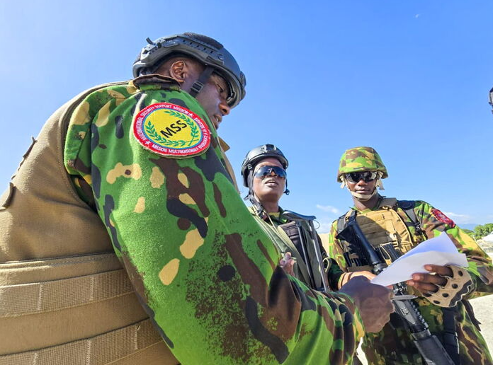 An image of Haiti security forces, alongside MSS, recaptured Télcos Station.