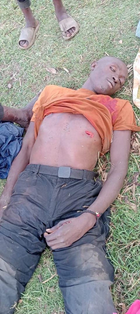 The late Evans Ouma after he was reportedly stabbed during violent chaos at a relief event organized by Nyando MP Jared Okello.