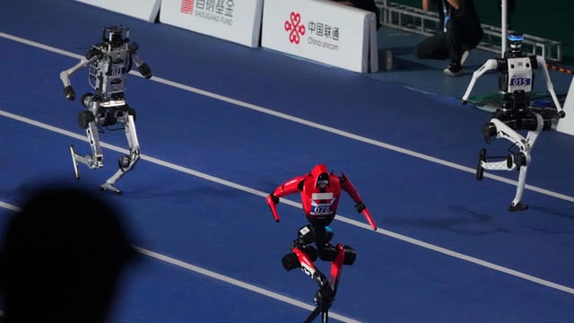Humanoid robots beat human benchmark in 100-metre sprint but practical limits remain