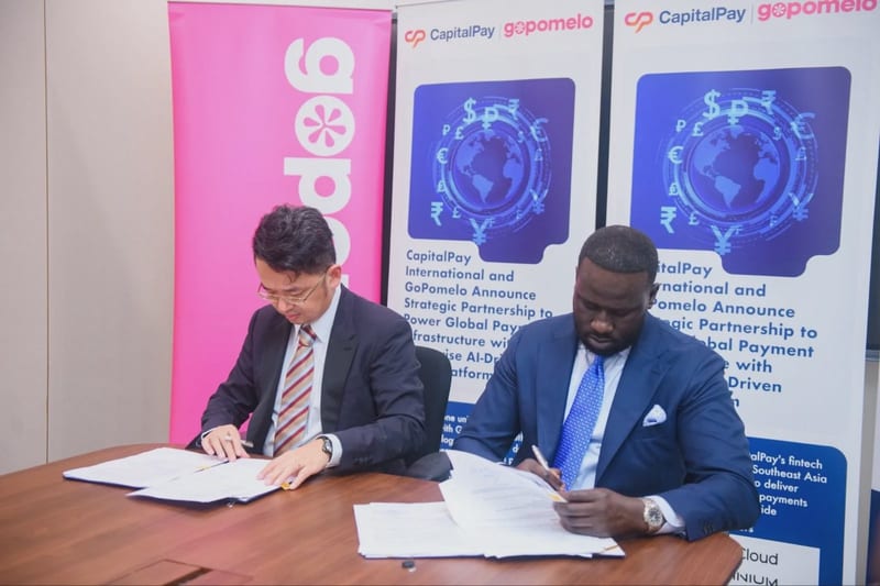 Capital Pay International Limited CEO Garang Malek with Viatrans global head of trade facilitation Morgan Lepinoy during a partnership signing in Nairobi:courtesy
