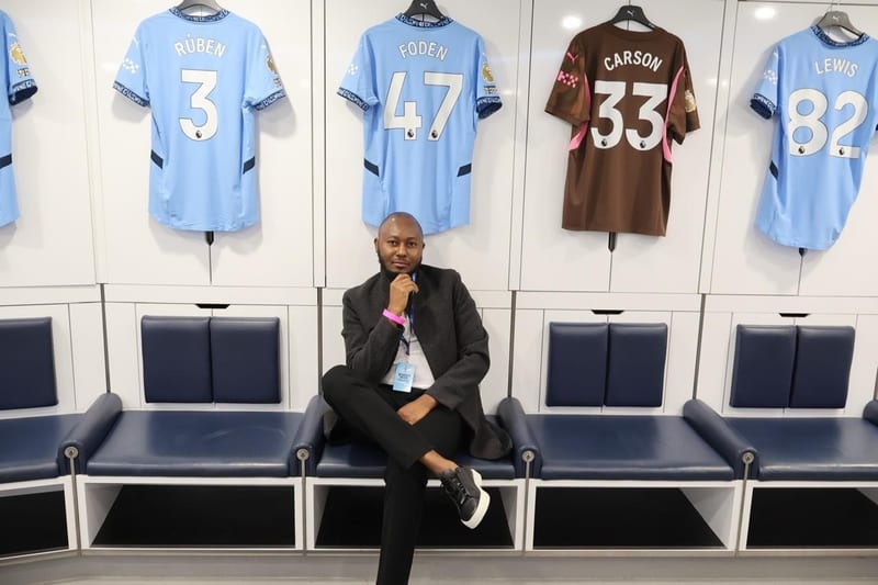 Morris Musyoka inside the Manchester City's Etihad Stadium changing room