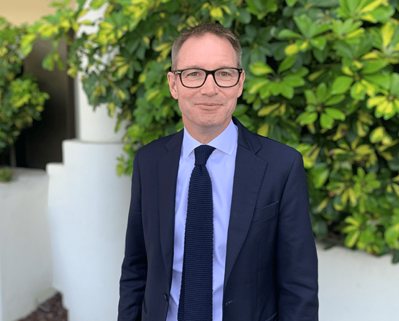 A portrait of British High Commissioner to Kenya, Neil Wigan.