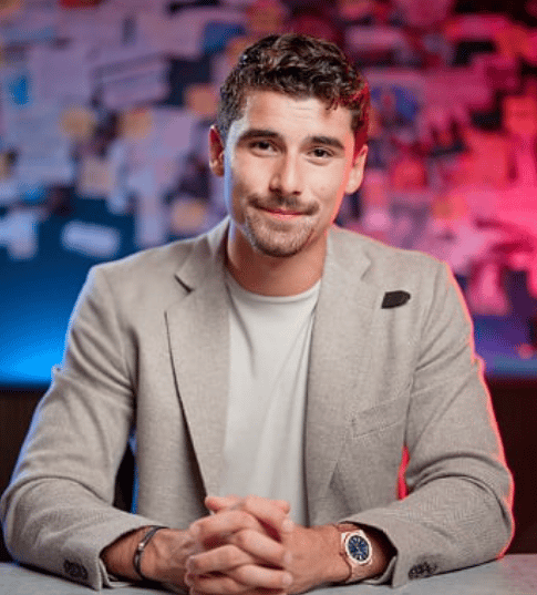 A professional portrait of Iman Gadzhi, digital marketing expert, entrepreneur, and founder of IAG Media, known for his significant...