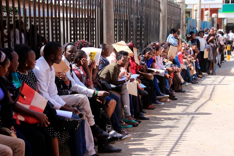 Jobseekers queue to hand in their applications