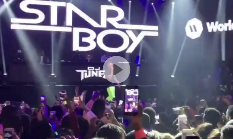 Utmost Ratchetry: Crazy fan tries giving Nigerian singer Wizkid a blowjob during stage performance