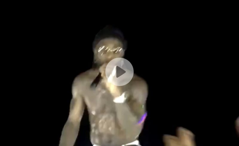 Video: Nigerian artiste Burna Boy kicks female fan who tried robbing him during a concert