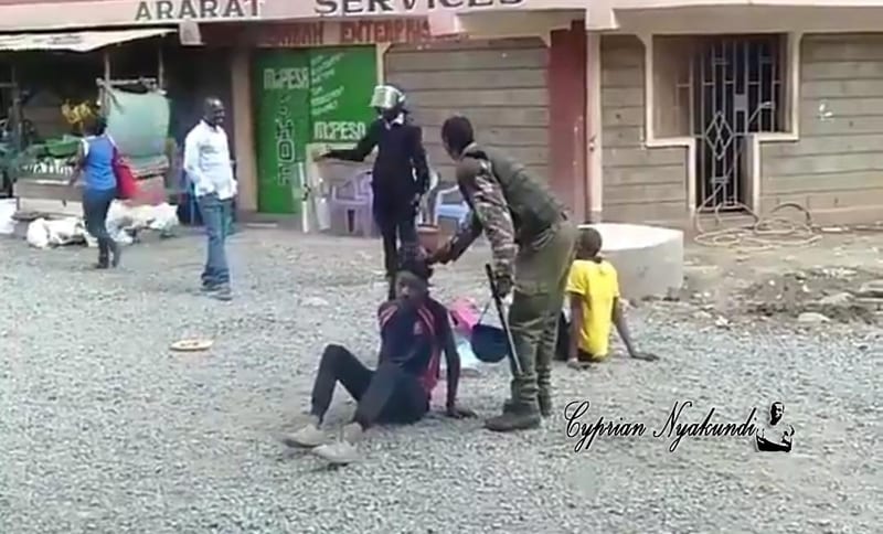POLICE BRUTALITY — Police Officer Caught On Camera Beating Up An Innocent University Student In Juja Town