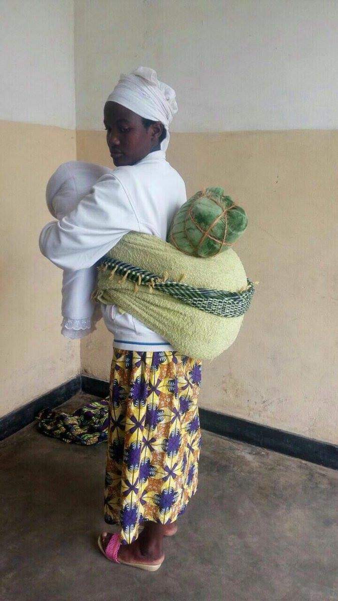 HILARIOUS PHOTOS — Kenyan Woman Caught Transporting Weed On Her Back Disguised As A Baby