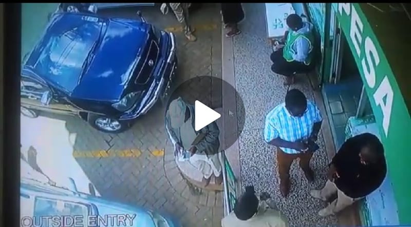 VIDEO — Three Men Rob A Man Just Moments After He Exists M-Pesa Shop