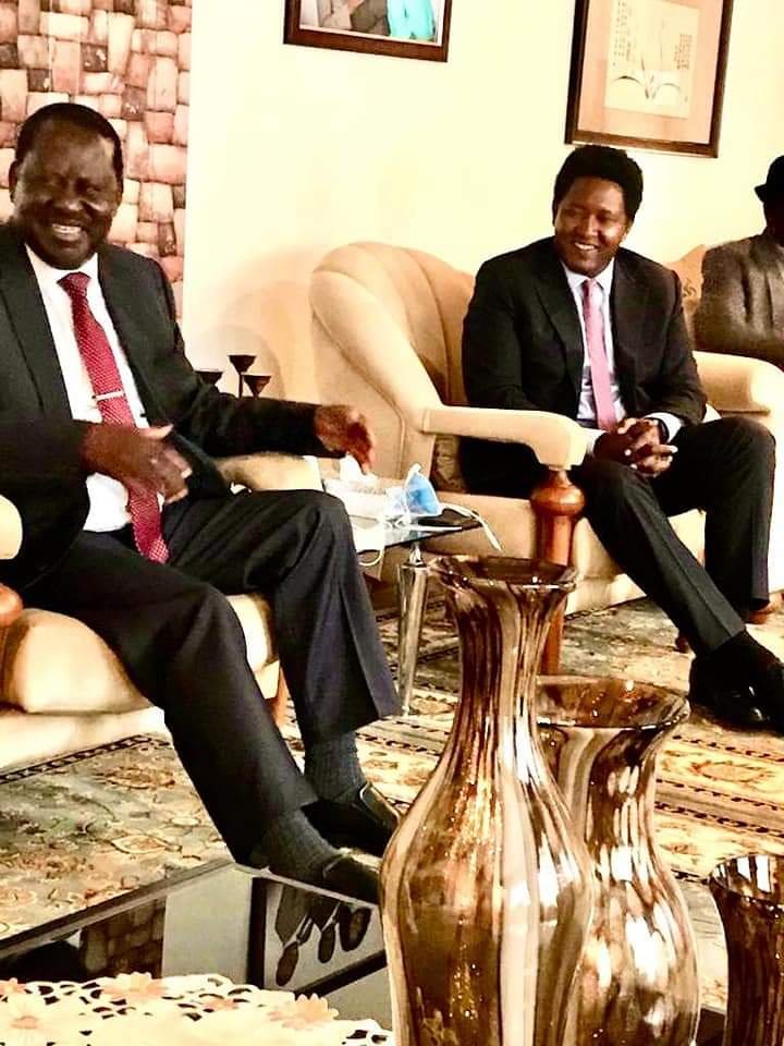 CAPTION: ODM Party Leader Raila Odinga with Narok Senator Ledama Ole Kina and a section of Maasai leaders at his Karen home this morning where his forgiveness was delivered