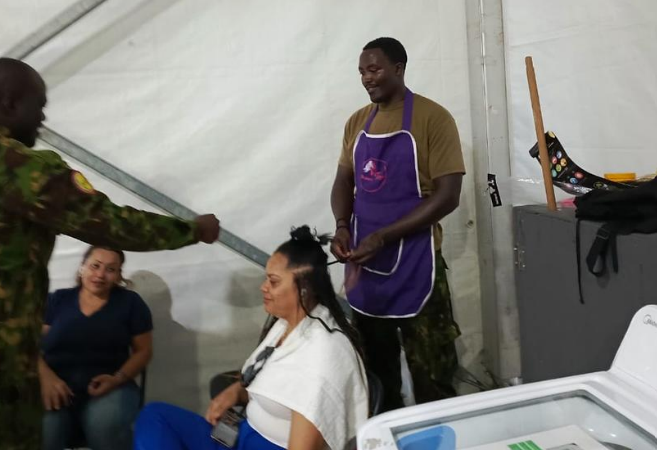 A Kenyan officer deployed to Haiti is seen braiding hair inside the mission camp, a reflection of the growing discontent among security personnel over the handling of their deployment. Officers have raised concerns about mismanagement, poor leadership, and non-operational assignments that have left some engaged in non-essential tasks while others struggle under harsh conditions. The grievances, which include financial hardships, delayed allowances, and inadequate protective gear, have intensified following the deaths of two Kenyan officers in recent weeks. Some officers have accused senior commanders of favouritism and neglect, warning that morale is at an all-time low as logistical and leadership failures undermine their mandate.