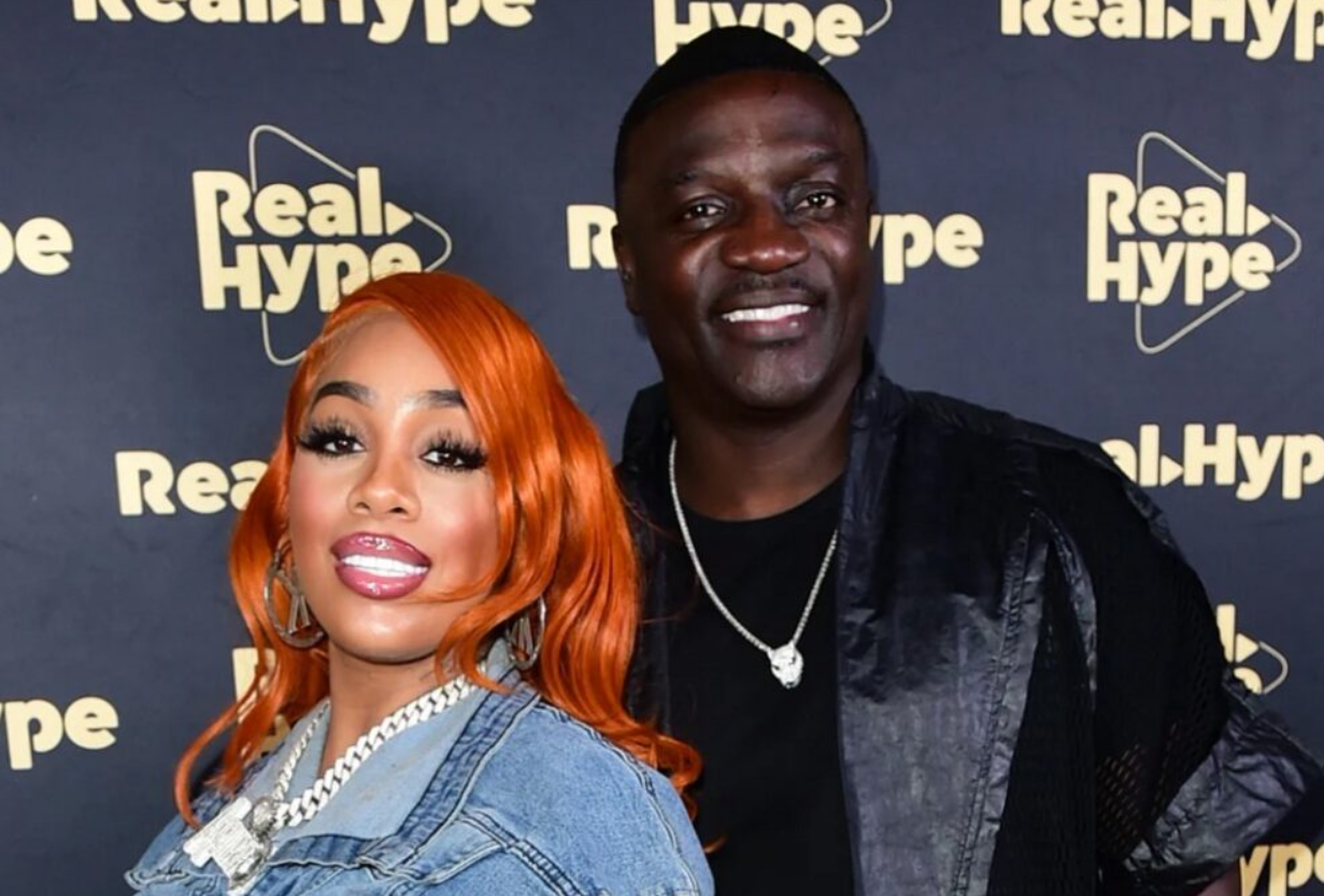 An image showing Akon and his wife.